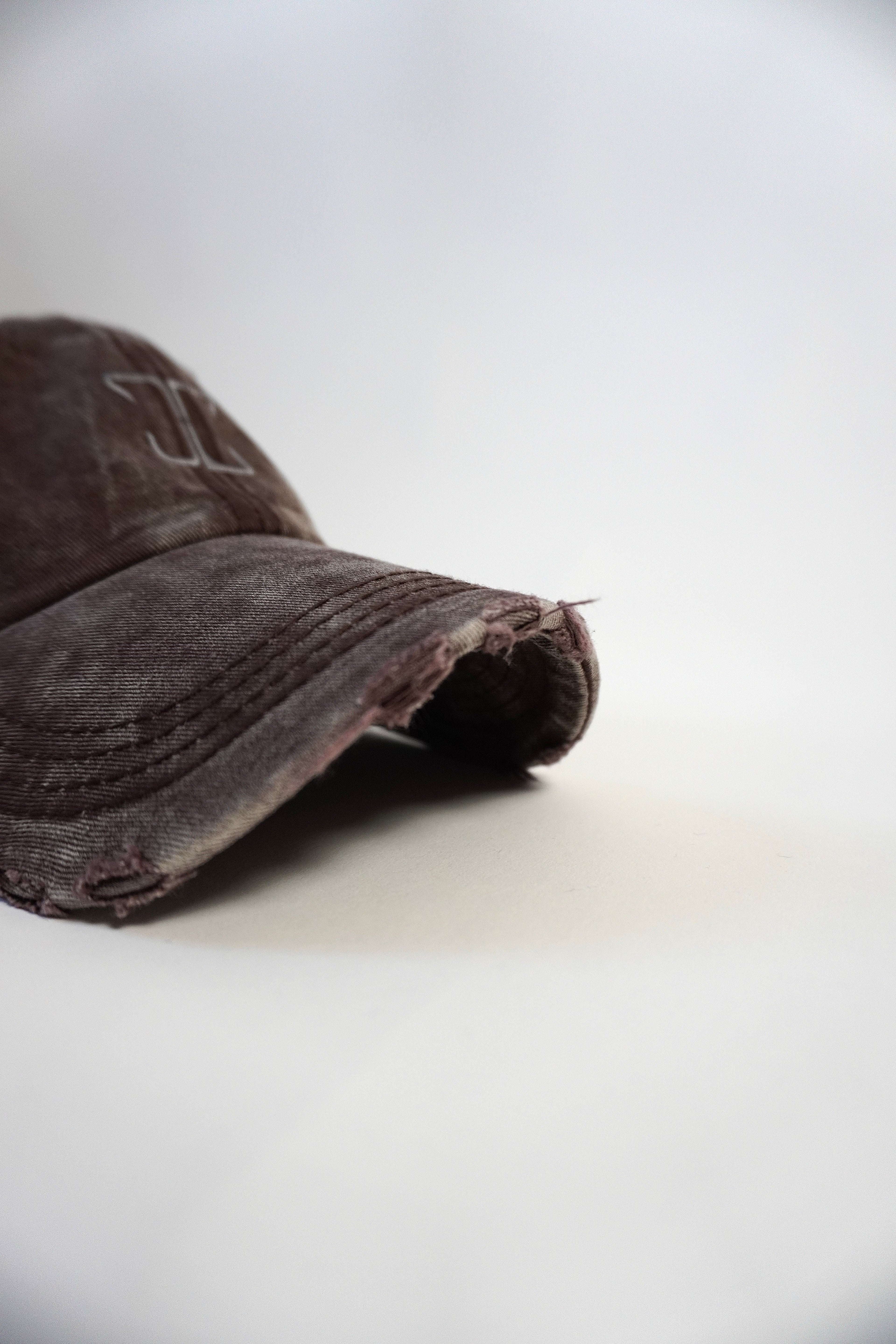 Brown Cap Born on Edge